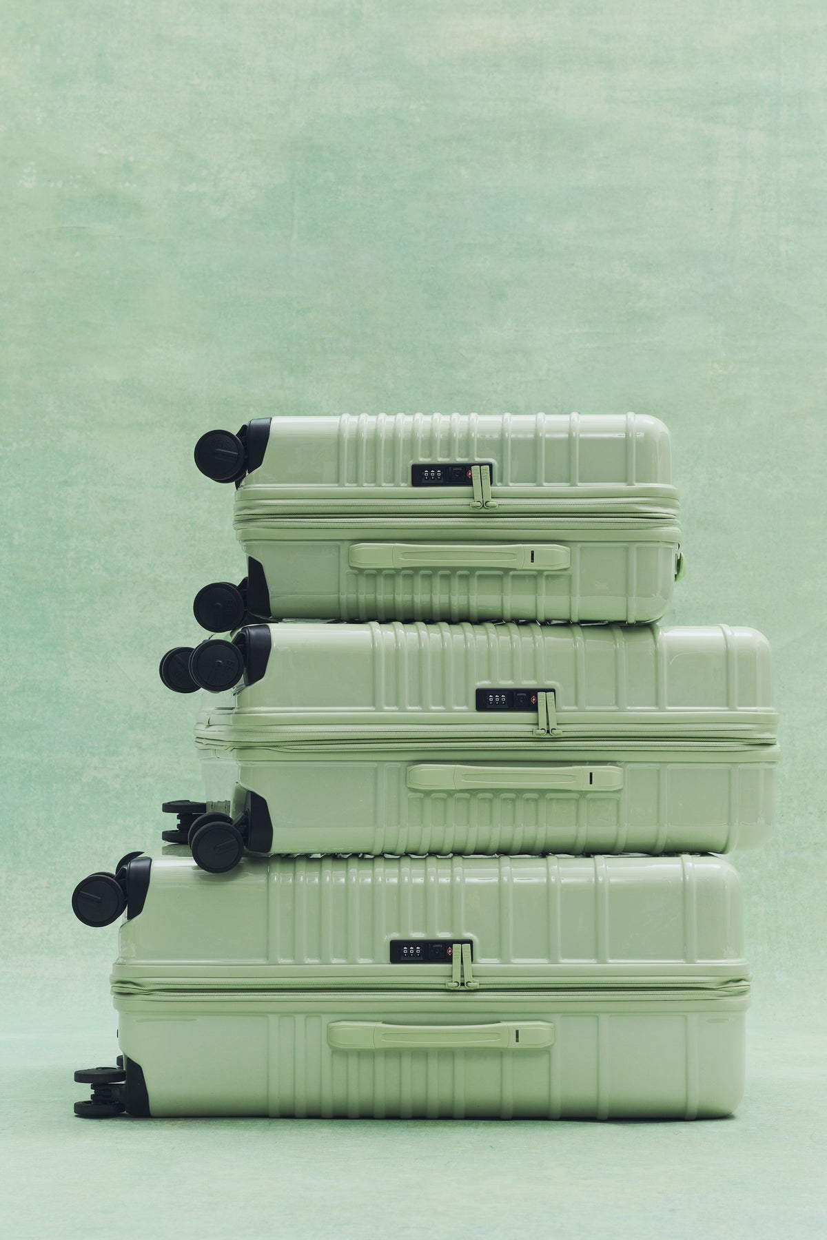 The Medium Check-In Roller in Glossy Mint
