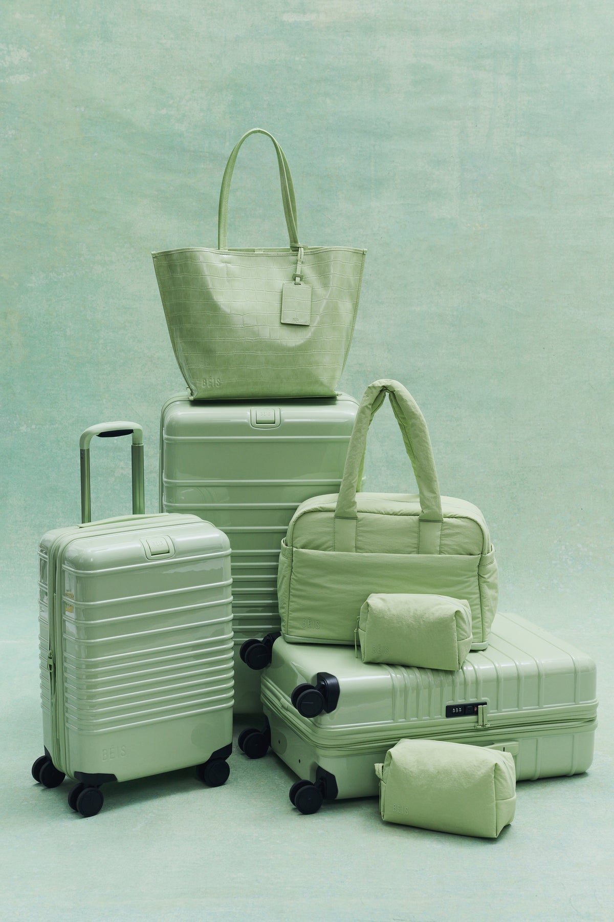 The Medium Check-In Roller in Glossy Mint
