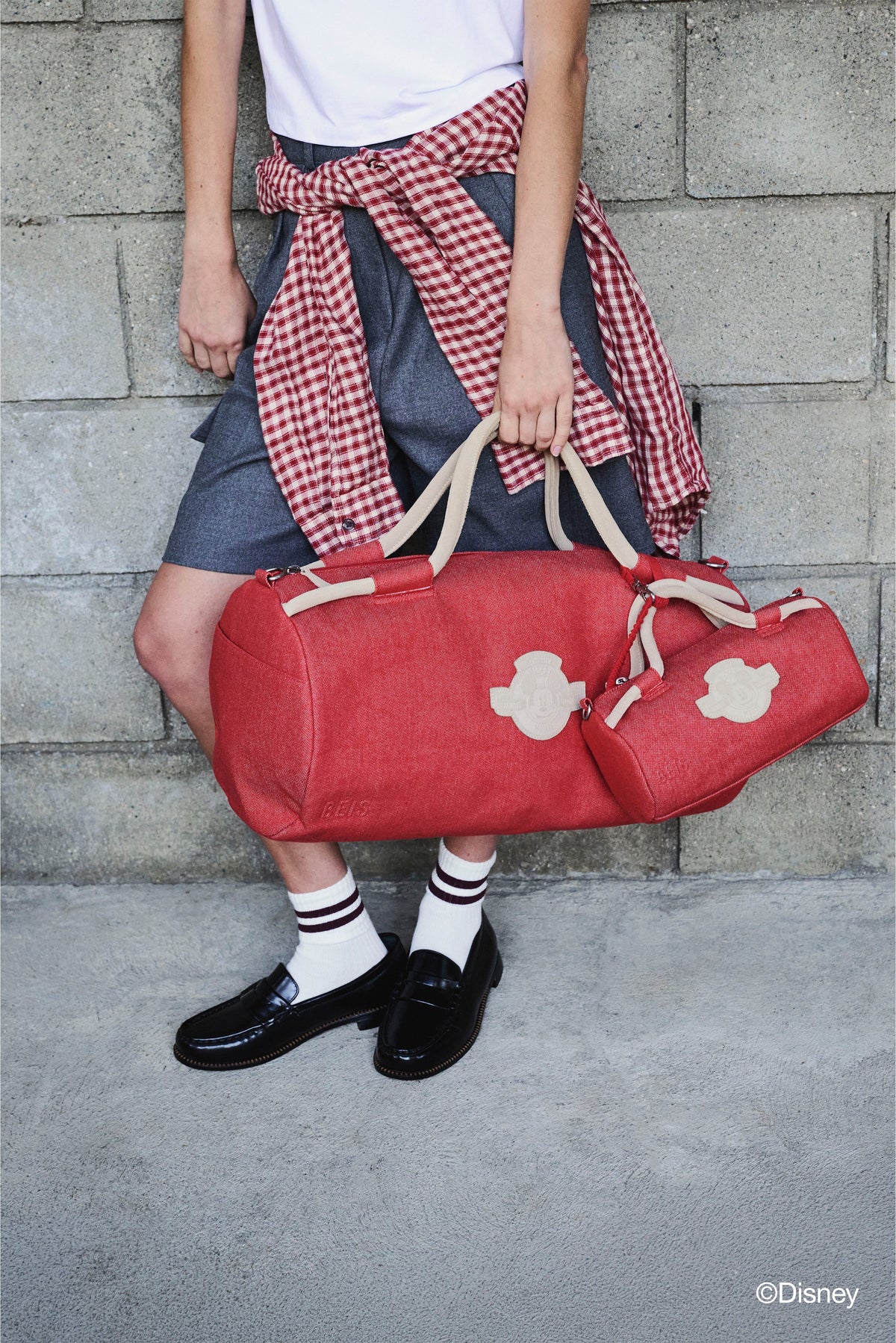 The Disney Large Duffle in Red Jeans